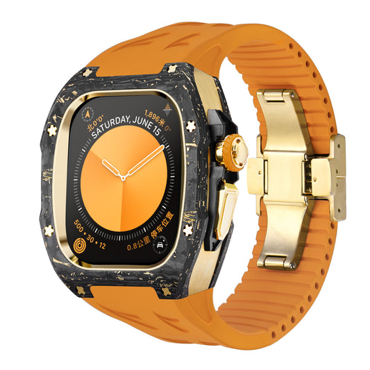 Ken Sailor CF-G Orange forged carbon Apple Watch conversion with gold hardware and solar orange silicone strap, angle view.