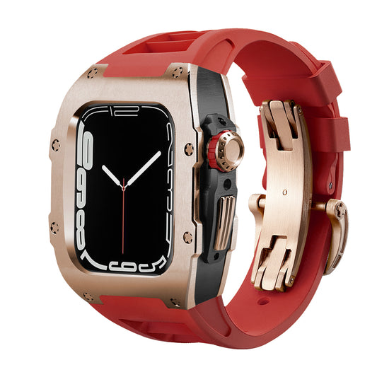 Ken Sailor T Series Apple Watch Ultra conversion kit with brushed rose gold bezel, black reinforced mid-case, red silicone sport band, deployment clasp and luxury aftermarket detailing installed on Apple Watch Ultra 49mm.
