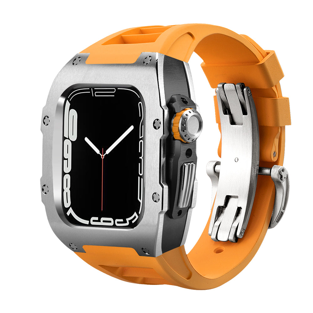 Ken Sailor T Series Apple Watch Ultra conversion with brushed silver bezel ring, black mid-case, orange silicone performance band, and stainless deployment clasp for a sport-lux mechanical upgrade.
