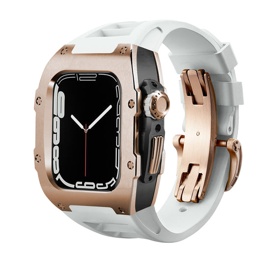 Ken Sailor T Series conversion case for Apple Watch Ultra featuring brushed rose bezel, black mid-case, and white silicone performance strap with matching deployment clasp, designed to create a luxury mechanical watch aesthetic while retaining full Apple functionality.
