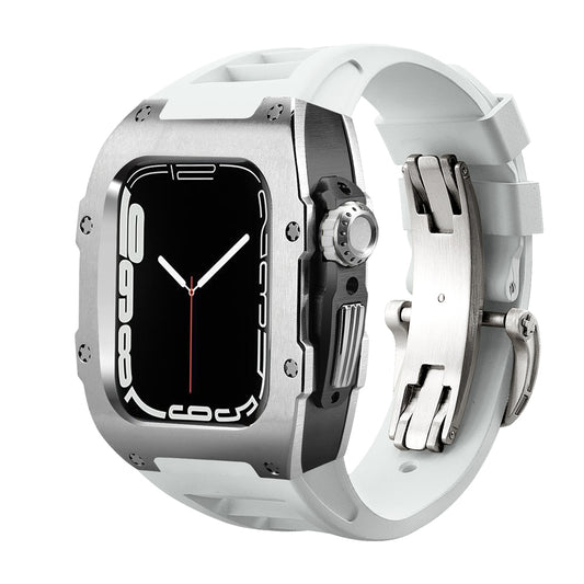 Ken Sailor T Series dual-tone case for Apple Watch Ultra featuring brushed silver top case with black inner shell and stainless deployment clasp paired with white silicone performance band for a luxury watch conversion appearance.
