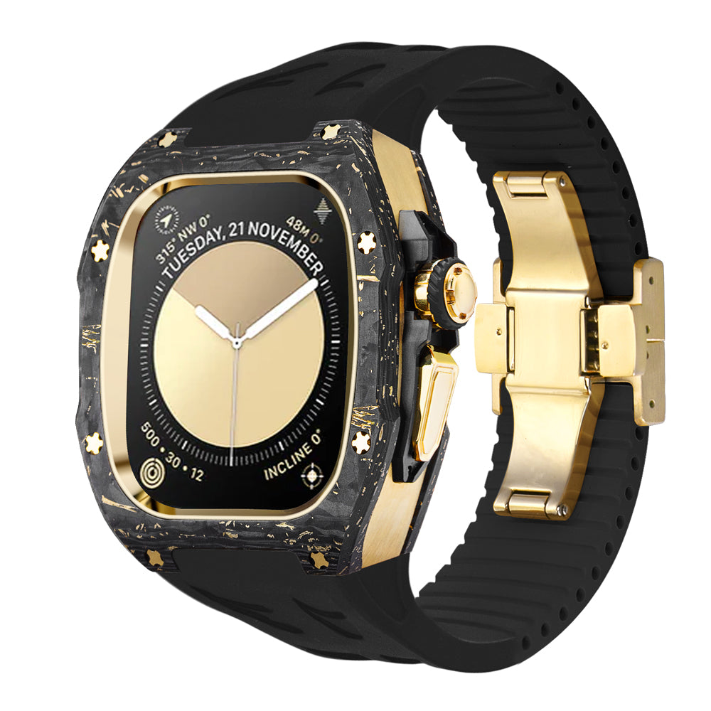 forged carbon apple watch body kit with gold hardware and black silicone performance strap, deployant clasp, premium luxury modification case for apple watch ultra, ken sailor cf-g collection, forged-carbon bezel with gold crown and side guards, high contrast black band for lifestyle and sport use, premium accessory product photography front 3/4 angle