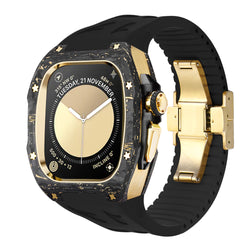 forged carbon apple watch body kit with gold hardware and black silicone performance strap, deployant clasp, premium luxury modification case for apple watch ultra, ken sailor cf-g collection, forged-carbon bezel with gold crown and side guards, high contrast black band for lifestyle and sport use, premium accessory product photography front 3/4 angle