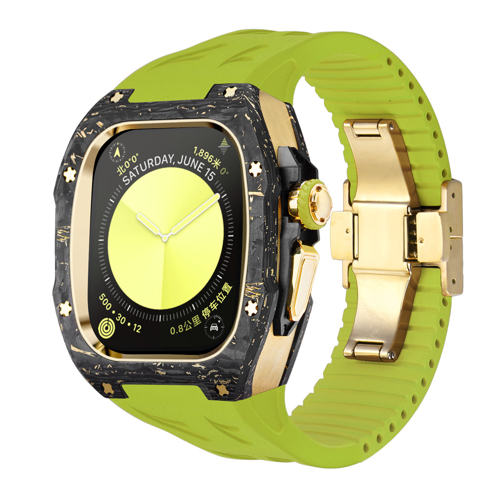 forged carbon apple watch case with gold hardware and green silicone strap, front angled product photo of high end luxury apple watch ultra conversion kit with deployant clasp and carbon marbling accents for ecommerce listing